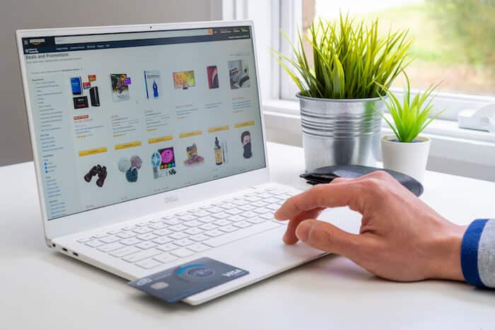 Product research: person using a laptop to shop online