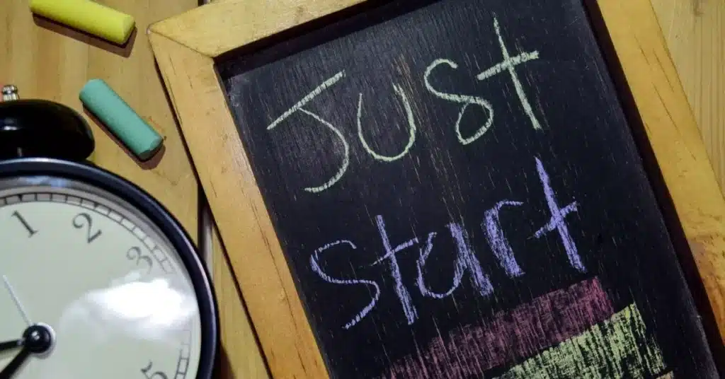 Product funding mindset message written on a chalkboard encouraging founders to start building.